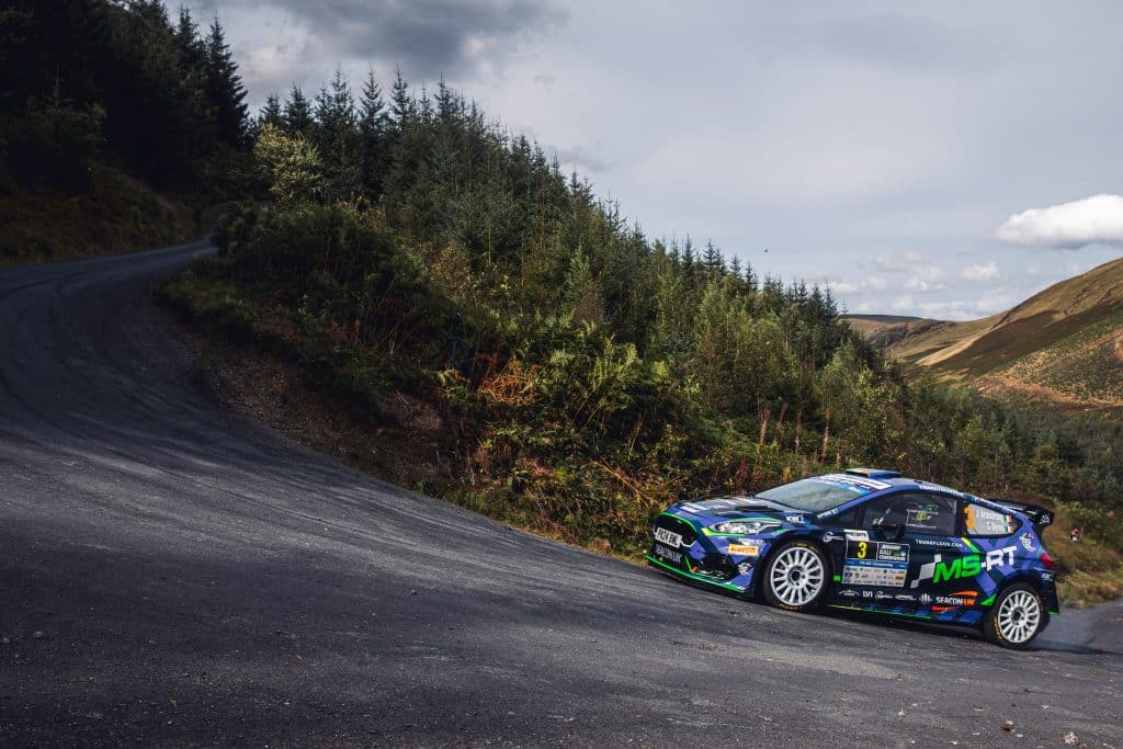 car going up a steep track